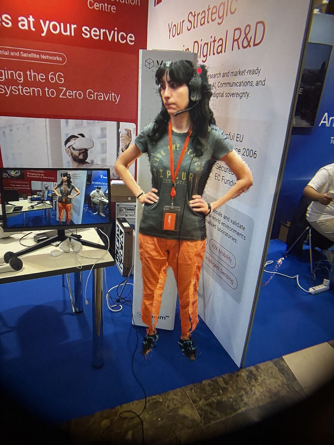 A Volum team member at the i2CAT booth during EuCNC & 6G Summit 2026