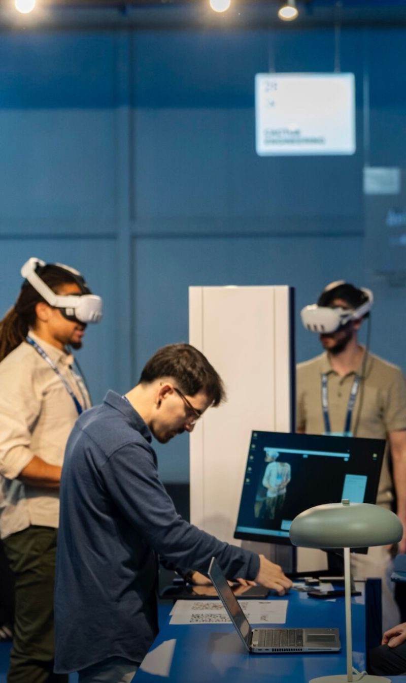 Visitors wearing mixed reality headsets during a live HoloTotem demo