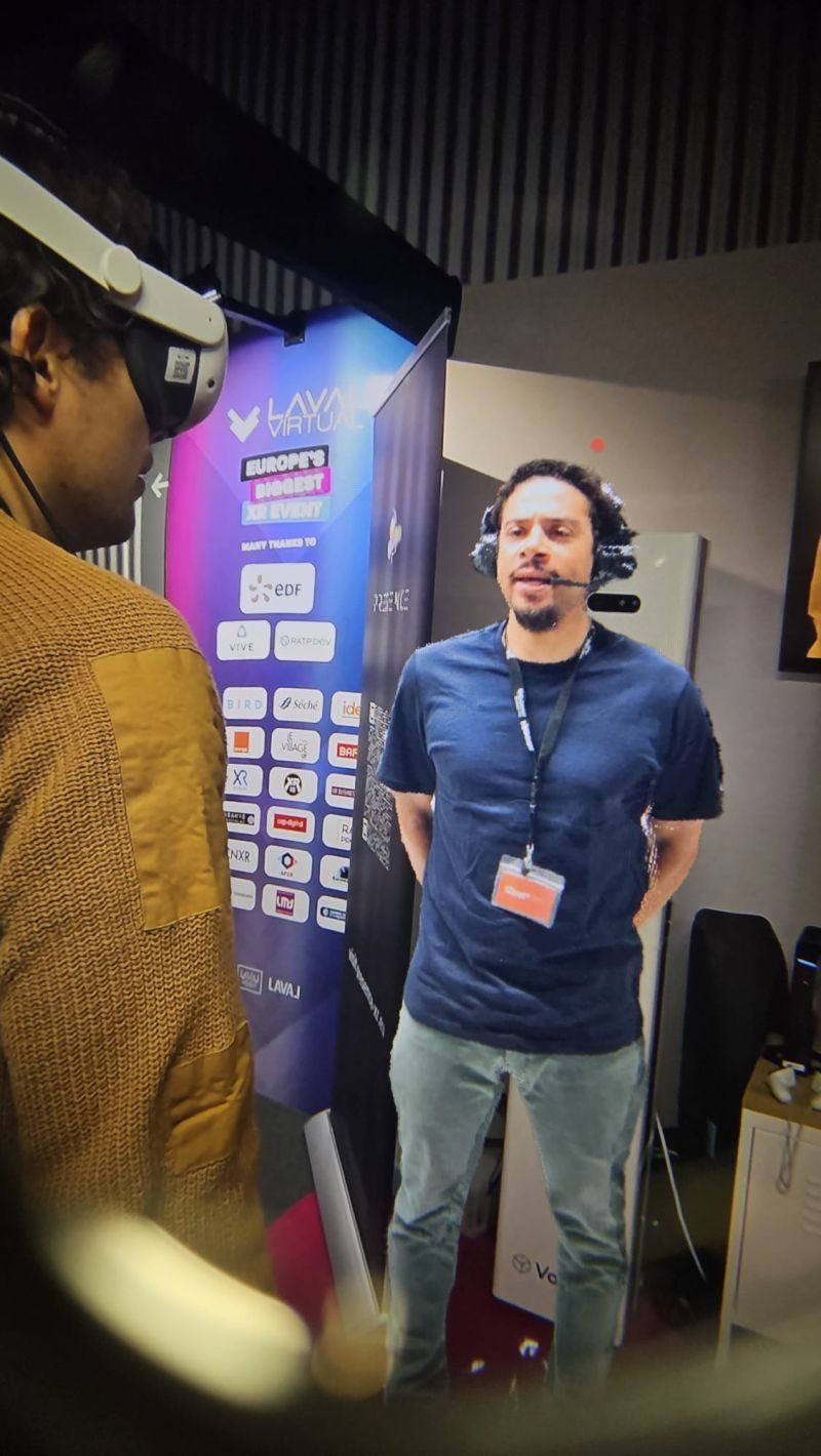 A visitor wearing a mixed reality headset at the PRESENCE-xr stand