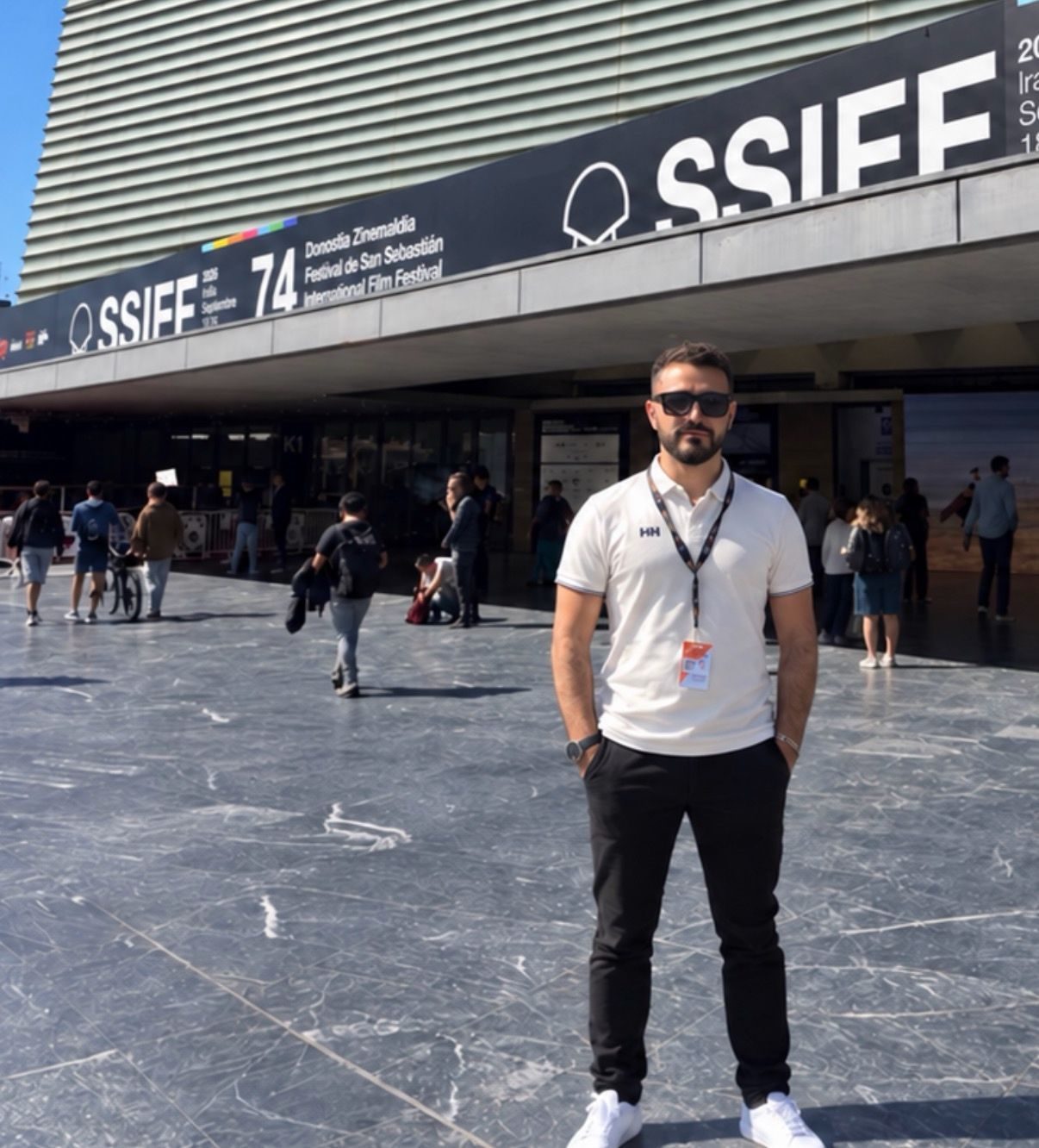 A Volum team member outside the Kursaal venue during the 74th San Sebastián International Film Festival
